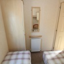 second view of twin bedroom