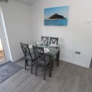 Dining table and chairs in Pathfinder Lodge