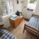 Shepherds Hut with bed and table