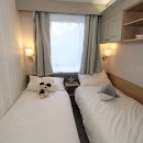 twin bedroom in the 2023 Swift Moselle Lodge 