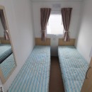 twin beds in the 2009 Delta Darwin