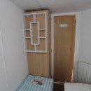 twin bedroom with wardrobe