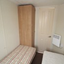 wardrobe in twin bedroom