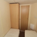 third bedroom with wardrobes