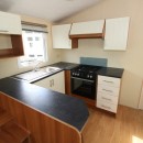 modern kitchen with oven and sink