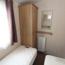 twin beds with wardrobe