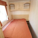 double bed by the windows
