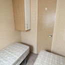 second view of twin bedroom