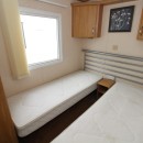 third bedroom with wardrobes