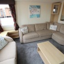 lounge with sofas and fire in the 2011 Swift Moselle
