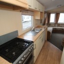 cooker and sink in kitchen