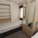 twin bedroom with wardrobe