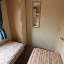 second view of twin bedroom