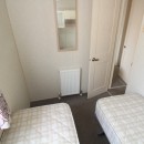 another view of the twin bedroom