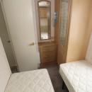 second view of twin bedroom