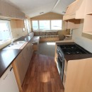 galley kitchen to lounge in the 2011 Willerby Westcoast