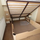 lift up bed in the double bedroom
