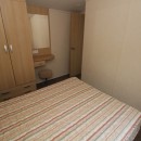 2012 Swift Burgundy double bed with wardrobe
