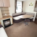lounge with dining table in the 2013 Swift Burgundy