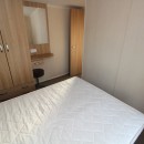 double bedroom with wardrobes in the 2013 Swift Burgundy