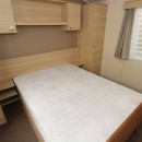 double bed with storage over