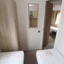 twin bedroom to door