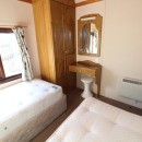 second view of twin bedroom