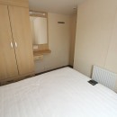double bedroom with wardrobes in the 2012 Swift Burgundy