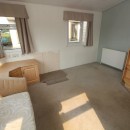 lounge with radiator in the 2004 Willerby Westmorland