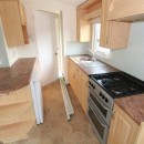 kitchen with breakfast bar in the 2004 Willerby Westmorland
