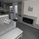 sofas and fire place in the 2017 Regal Elegance