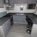 kitchen with breakfast bar in the 2017 Regal Kensington