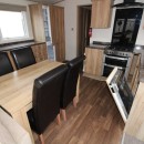 dining area to kitchen in the 2016 ABI Ambleside