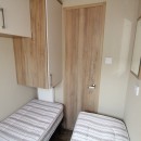 second view of twin bedroom