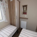 third bedroom with twin beds in the 2016 ABI Oakley