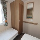 second view of twin bedroom