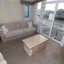 lounge with front patio doors in the 2013 Swift Bordeaux