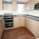 u shaped kitchen in the 2014 Swift Burgundy