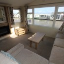 lounge with large front windows in the 2013 Willerby Avonmore