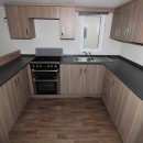 u shaped kitchen in the 2015 Swift Burgundy