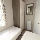 second view of twin bedroom