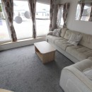 lounge with large front windows in the 2016 Willerby Sierra