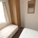 second view of twin bedroom