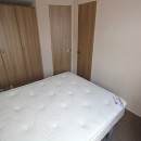 double bedroom with wardrobes in the 2011 Atlas Chorus