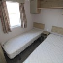 third bedroom with twin beds in the 2021 Atlas Mirage