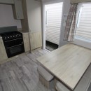 dining area to kitchen in the 2021 Atlas Mirage 