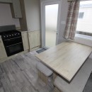 dining area to kitchen in the 2021 Atlas Mirage