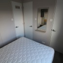 double bed with mirror