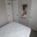 double bed with mirror