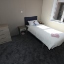 second bedroom in the 2018 Atlas Lilac Lodge